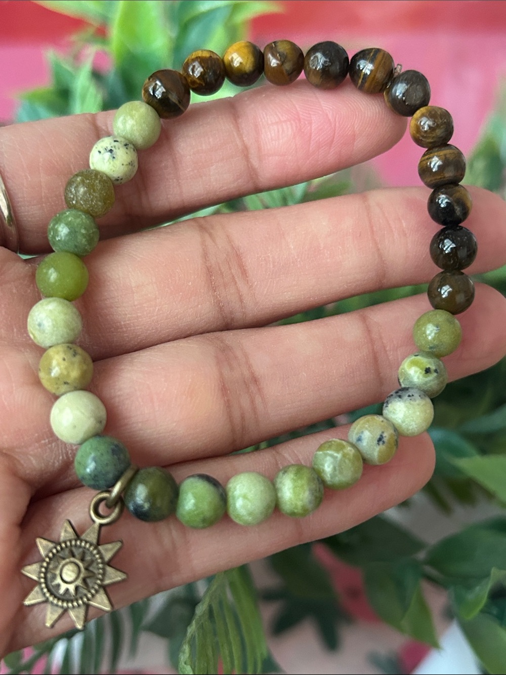 Handmade Chinese chrysoprase & tigers eye beaded bracelet with sun charm